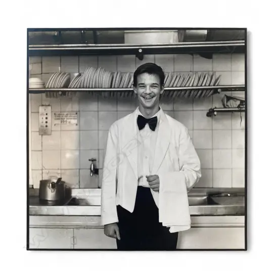 In the manner of Diane Arbus (1923-1971) ‘Busboy in kitchen’, c.1970